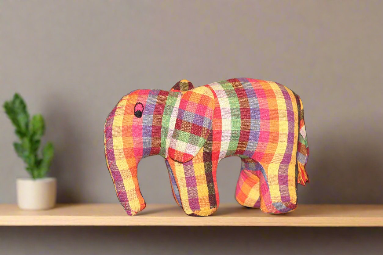 Say hello to Eley the Elephant, a vibrant blend of rainbow colors and as cuddly as can be, dreaming of a cozy home filled with love and joy!