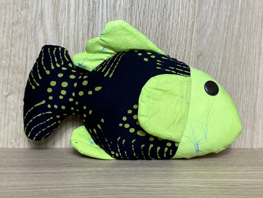 Meet Fioly the Fish, radiating vibrant energy and looking for a cozy home in a world filled with joy!